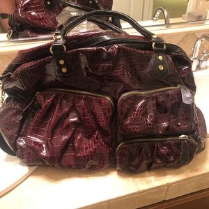 EUC snakeskin duffle bag
